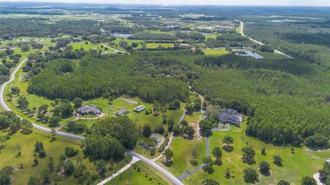 11933 Pasco Trails Blvd, House other with 4 bedrooms, 3 bathrooms and null parking in SPRING HILL FL | Image 61
