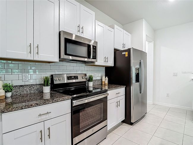 4567 Tuscan Loon Dr, Townhouse with 4 bedrooms, 3 bathrooms and null parking in Tampa FL | Image 22