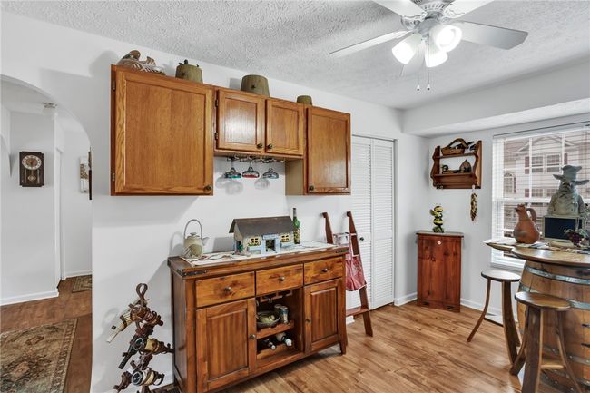 To the right of the bar area is the laundry (washer/dryer included). | Image 14