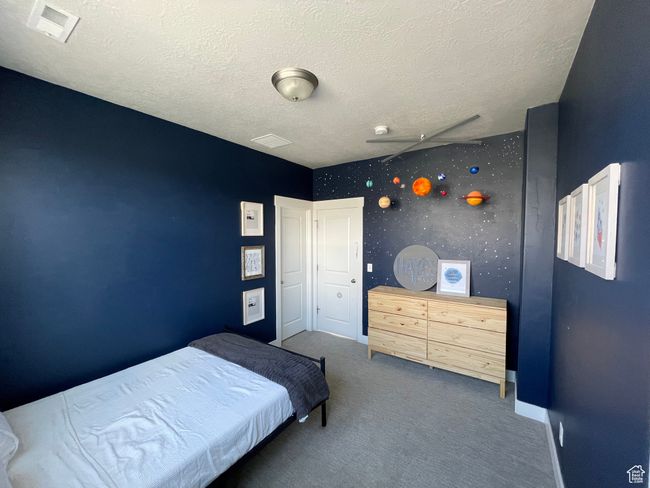 Carpeted bedroom | Image 56