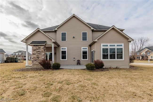 Back of house featuring a patio area and a lawn | Image 19