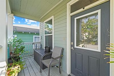 Lovely porch to relax on an autumn day. | Image 2