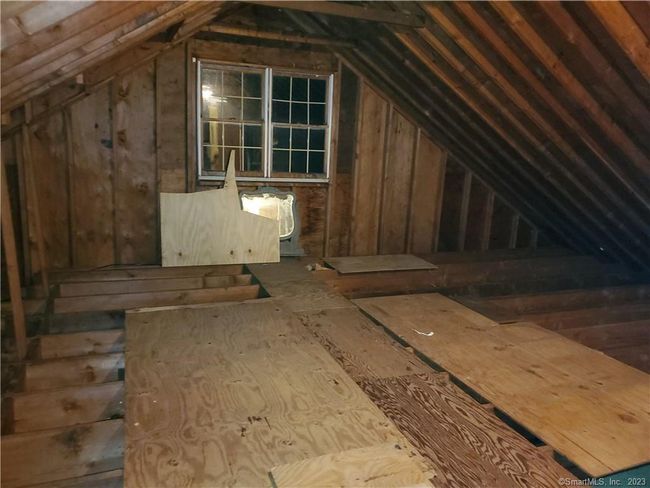 Walk-in attic could become bonus room living space. | Image 32
