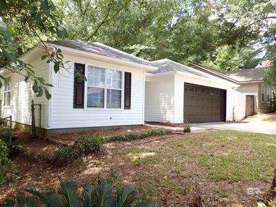 Ranch-style house featuring a garage | Image 3