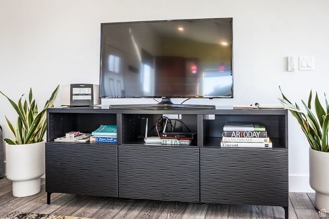 Room details featuring wood finished floors | Image 20
