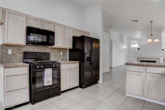 Kitchen featuring decorative backsplash | Image 13