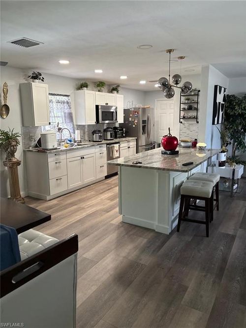 2702 Se 17th Pl, Cape Coral, FL, 33904-3214 | Card Image