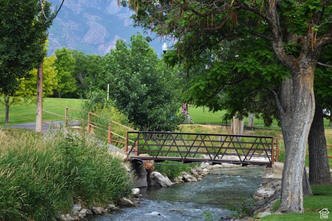 A short drive to miles of scenic trails, winding streams, and inviting playgrounds, with breathtaking parks and nature paths just moments away. | Image 25
