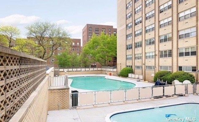 Community pool with fence | Image 12