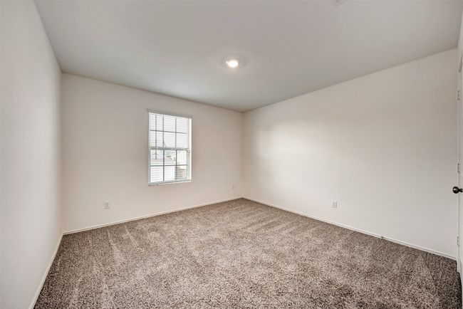Empty room with carpet flooring and baseboards | Image 24