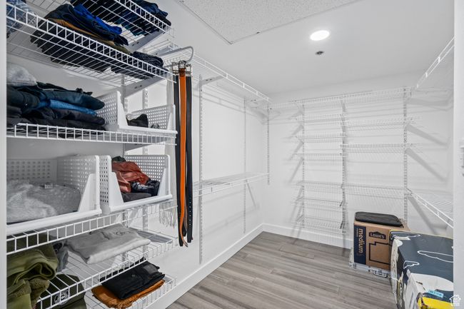 Primary Spacious closet with LVP flooring | Image 30