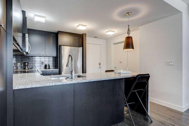 104 - 15 Aspenmont Heights Sw, Home with 2 bedrooms, 2 bathrooms and 1 parking in Calgary AB | Image 9