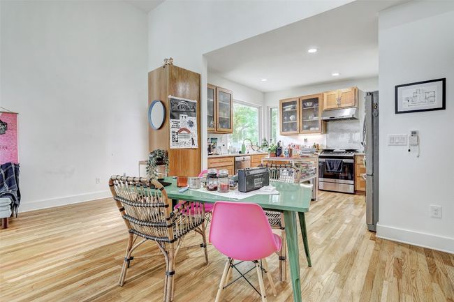 Dining space with baseboards, light wood-style floors, and recessed lighting | Image 30