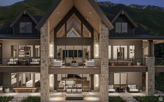Back of property featuring an outdoor living space, a mountain view, a patio, a standing seam roof, and board and batten siding | Image 4