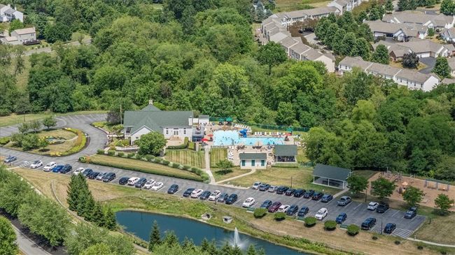 Perfectly situated within the neighborhood to take advantage of the pool, private clubhouse, sports, basketball and tennis courts, plus playgrounds. | Image 32