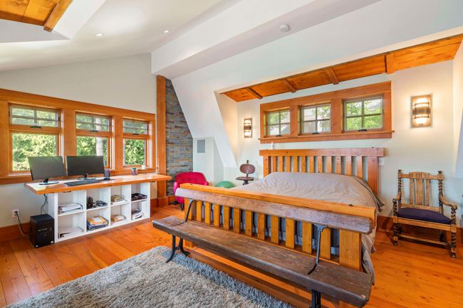 Bedroom featuring hardwood / wood-style flooring, multiple windows, baseboards, and recessed lighting | Image 18