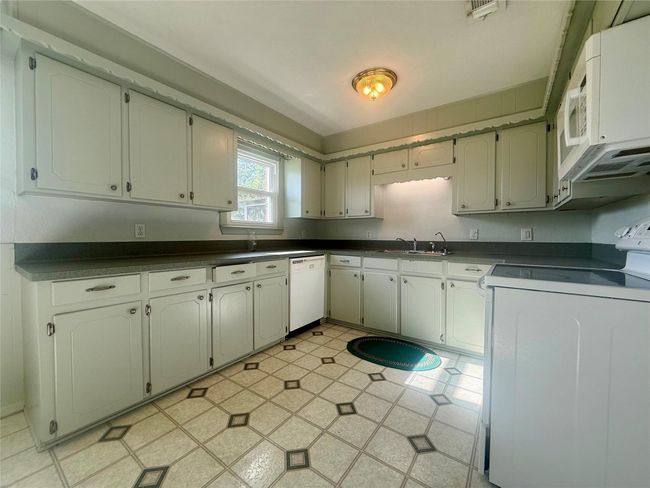 Kitchen with plenty of counter space and storage | Image 4
