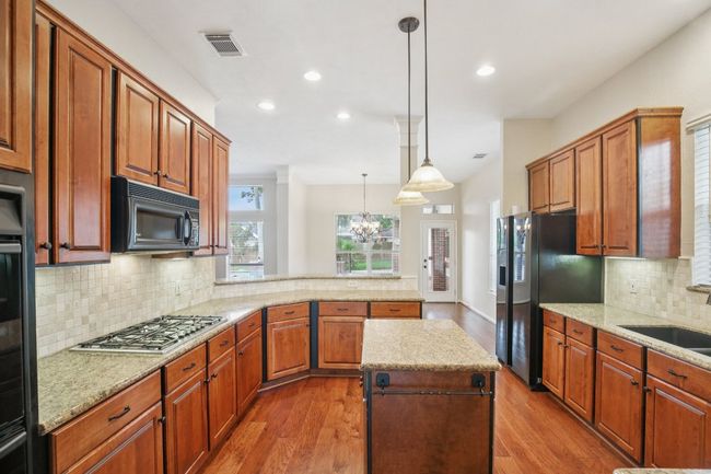 6611 Haughton Dr, House other with 4 bedrooms, 3 bathrooms and 3 parking in Spring TX | Image 11