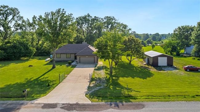 View of front of home with a front lawn and driveway | Image 39