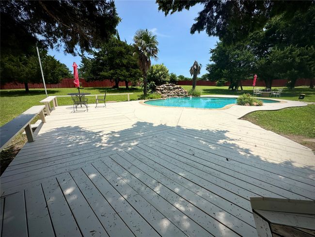 Swimming pool with a deck | Image 4