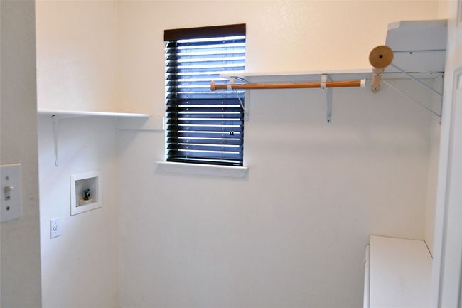 Laundry room featuring laundry area and hookup for a washing machine | Image 22