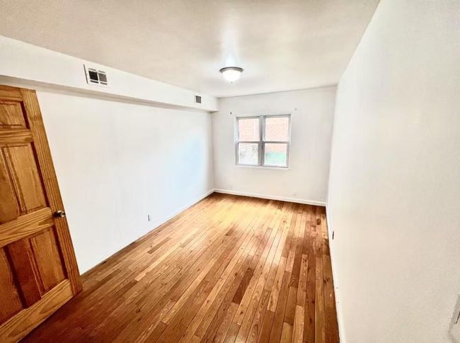 Empty room featuring light hardwood / wood-style flooring | Image 8