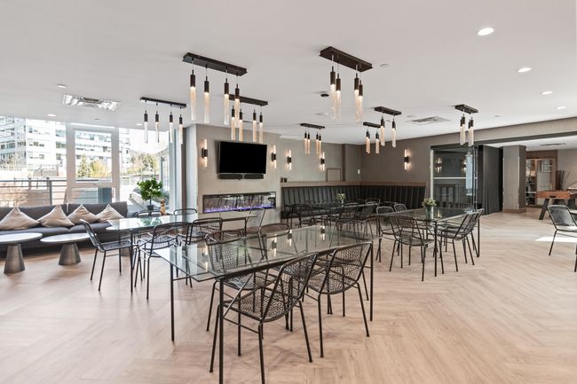 Dining room featuring floor to ceiling windows and recessed lighting | Image 29