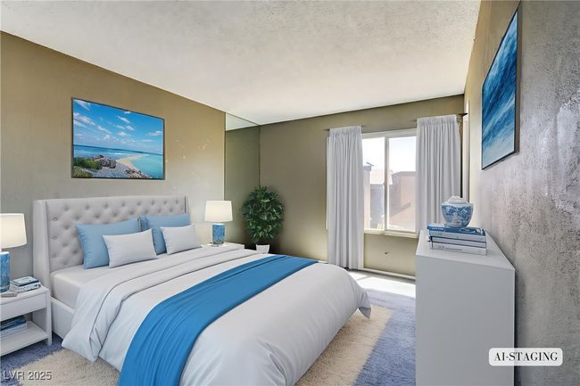 Bedroom featuring light carpet and a textured ceiling | Image 5