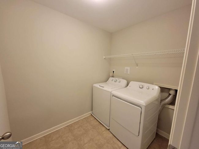 8265 Village Pl, Townhouse with 3 bedrooms, 3 bathrooms and 2 parking in Suwanee GA | Image 32