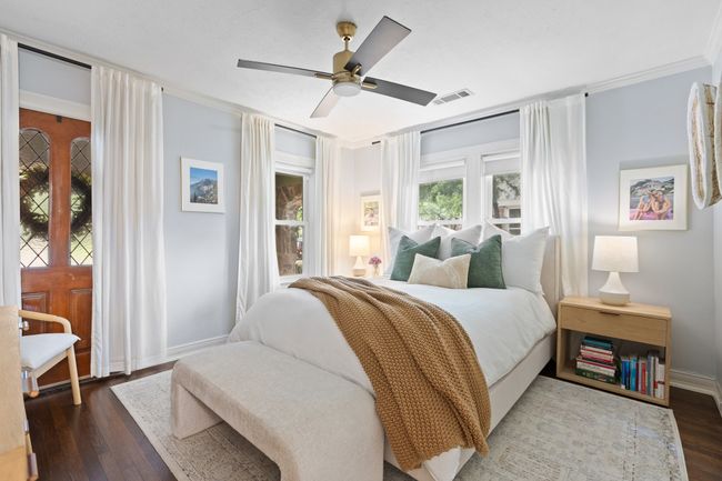 Secondary bedroom boasts tons of natural light | Image 17