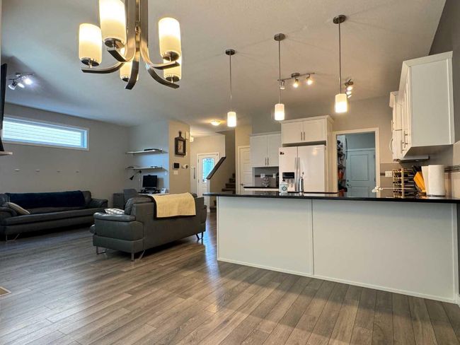 70 Moonlight Boulevard W, Home with 4 bedrooms, 3 bathrooms and 4 parking in Lethbridge AB | Image 12