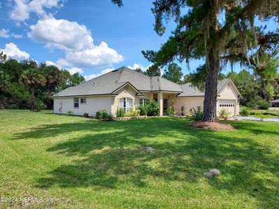 644 Live Oak Loop, House other with 3 bedrooms, 2 bathrooms and null parking in Crescent City FL | Image 1