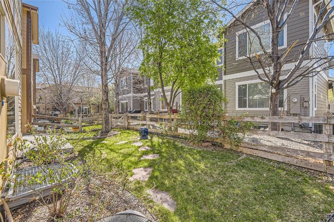 Shaded and fenced yard with irrigation system. HOA mows the yard! | Image 25