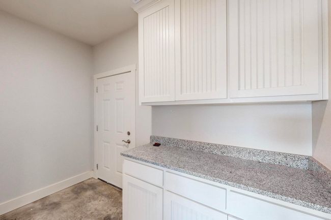 Laundry room featuring baseboards | Image 35