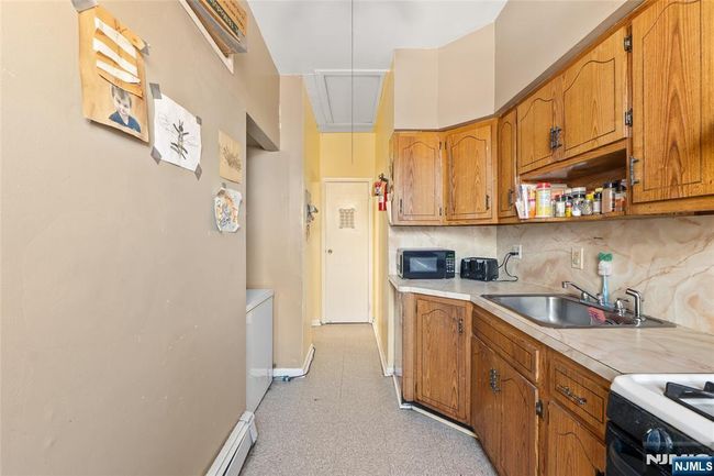66 Harrison Ave, Home with 6 bedrooms, 2 bathrooms and null parking in Garfield NJ | Image 7