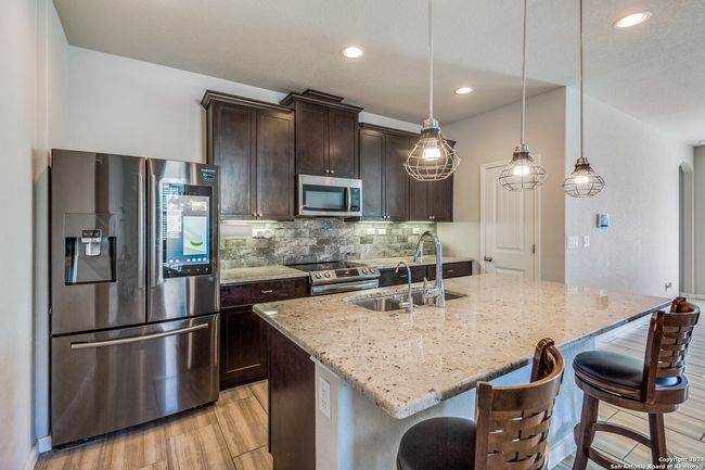 7939 Blackhawk Pass, House other with 4 bedrooms, 4 bathrooms and null parking in San Antonio TX | Image 6