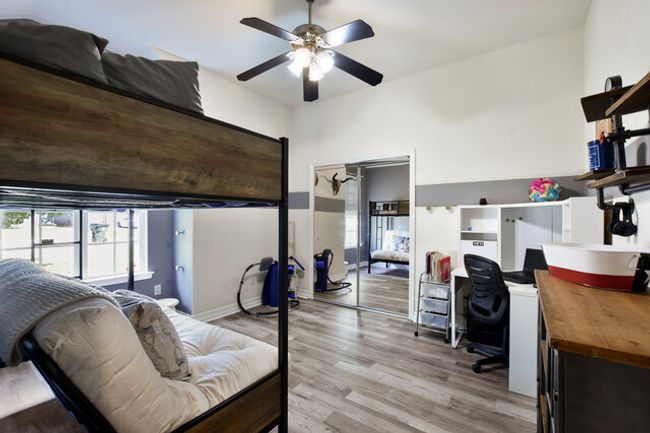 Office featuring light wood finished floors and ceiling fan | Image 26