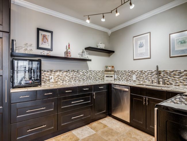 Room #3 makes for a great office or 3rd Bedroom, with wall to ceiling bookshelves, closet space, plantation shutters and ceiling fan! | Image 12