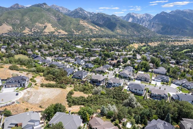 Aerial view of residential area with a mountain backdrop | Image 36