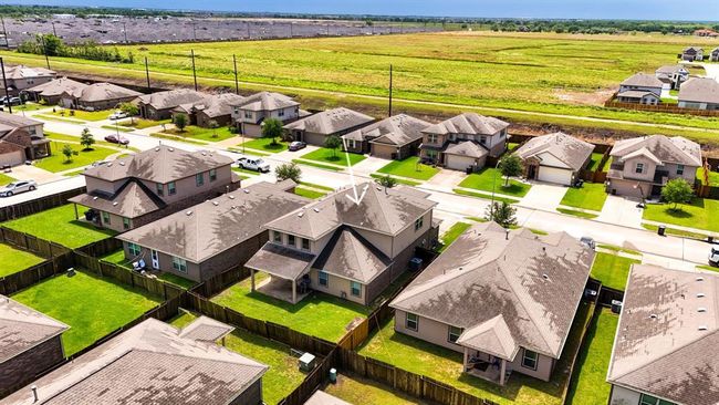 The community offer great access to amenities in a family friendly area, amenities including covered picnic area, playground, splash pad, basketball court, soccer fields, walking and bike trails. | Image 47