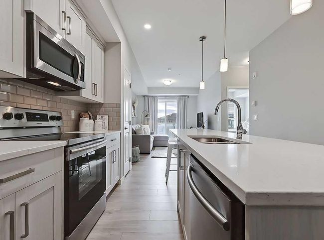 318 - 4350 Seton Dr Se, Condo with 1 bedrooms, 1 bathrooms and 1 parking in Calgary AB | Image 6