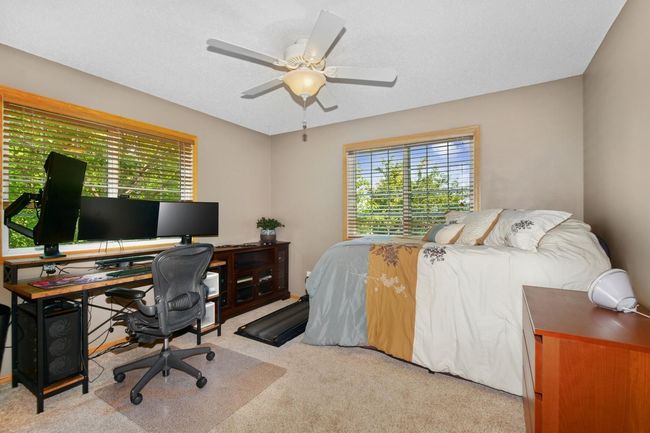 Spacious Bedroom #2 has a double closet & ceiling fan | Image 21