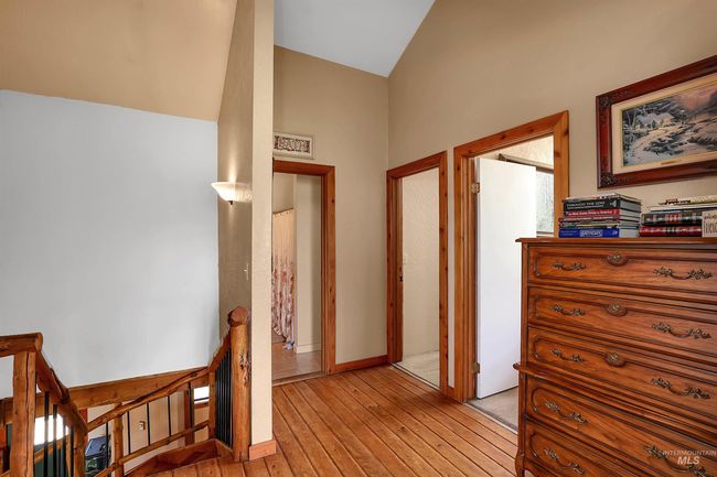 Hallway featuring an upstairs landing and light wood-type flooring | Image 30