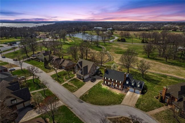 Aerial view at dusk featuring a water view | Image 52