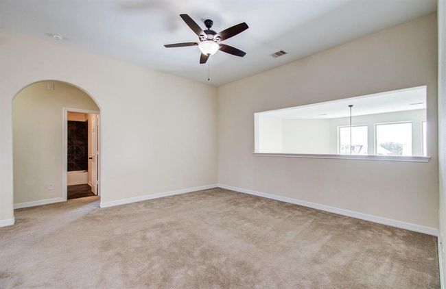 Upstairs game room overlooking living room below. | Image 26