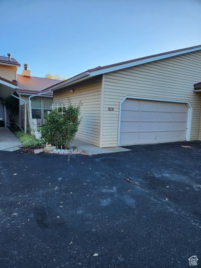 View of home's exterior featuring a garage | Image 1