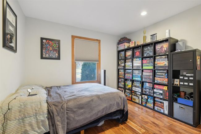 Bedroom featuring recessed lighting and wood finished floors | Image 24
