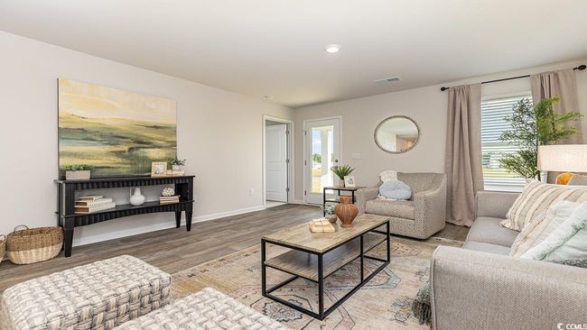 Living room with wood-type flooring | Image 12