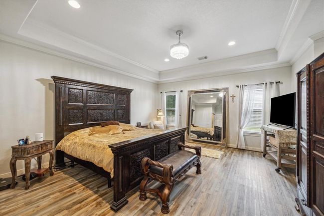 Primary bedroom on first floor. New laminate wood floors put in 2022 | Image 15