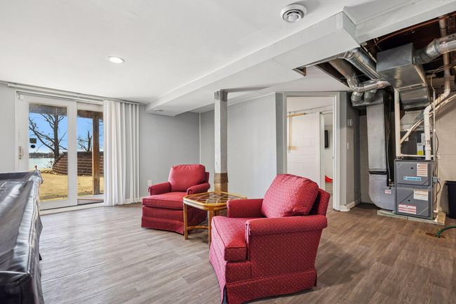 Enjoy lake views and easy access right from the lower level. | Image 13